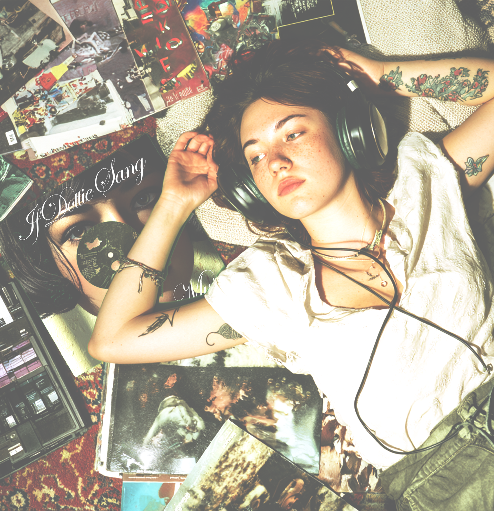 Merch background — woman with green hair on floor, vintage synthesizer, guitar pedals, paint splashes